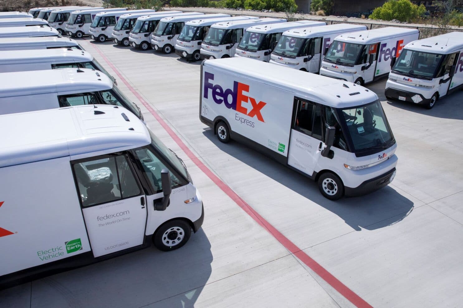 FedEx EV fleet vehicles parked in close proximity